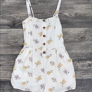 Hollister floral romper with pockets